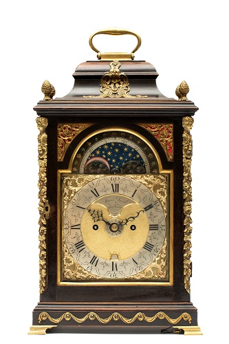 A good English ebonized table clock with moonphase for the Dutch market, Smith London, circa 1770.